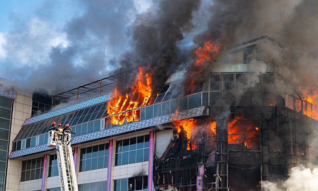 Burning building in thick smoke